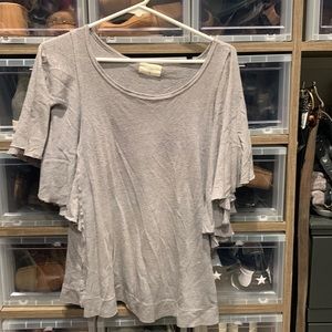 T.la gray top size medium. Top has flutter sleeves. Bought at Anthropologie